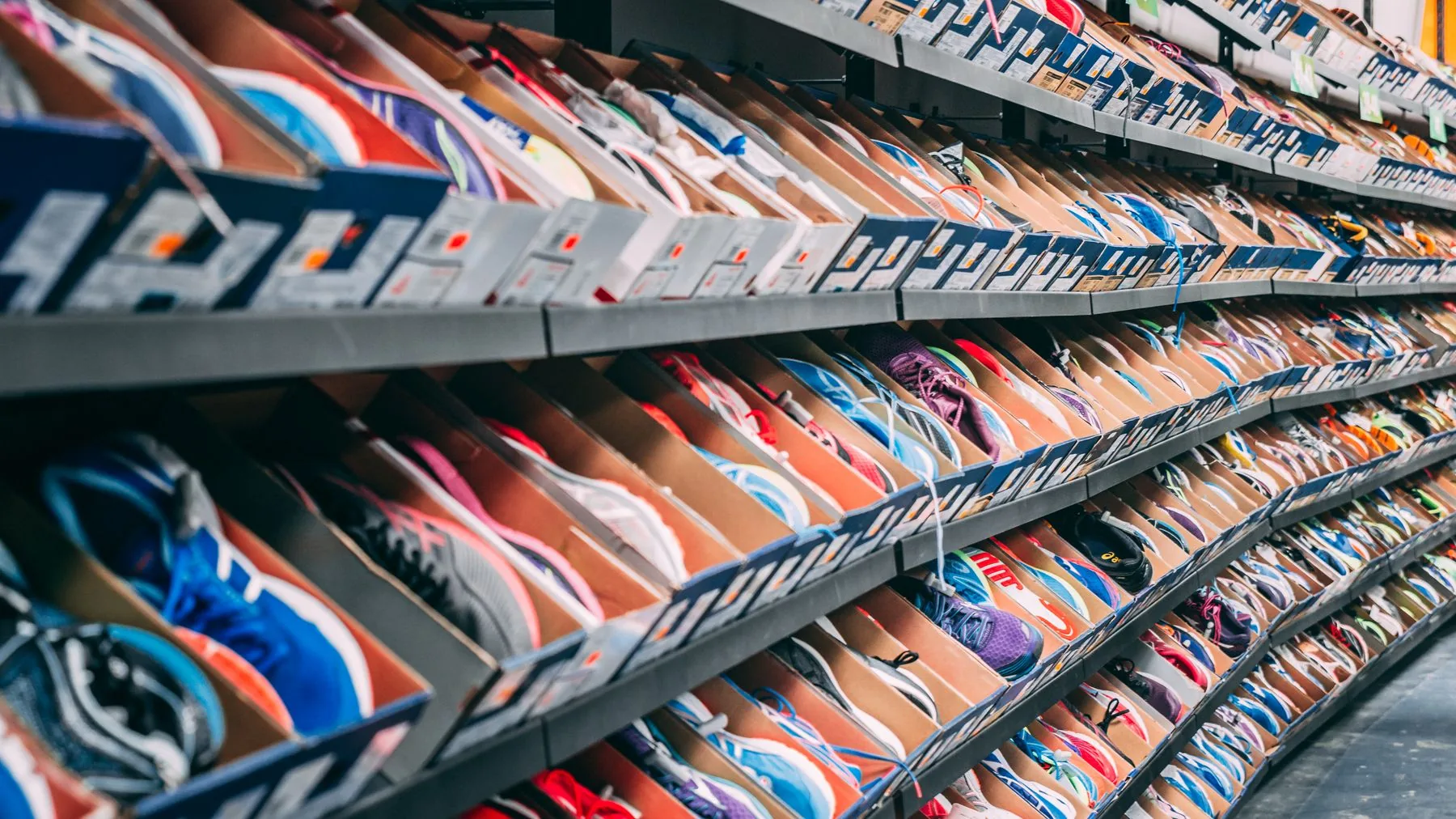 Shoes and boxes displayed on retail shelves